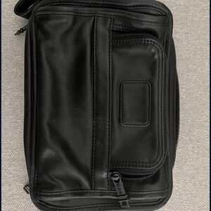 Tumi leather hand bag